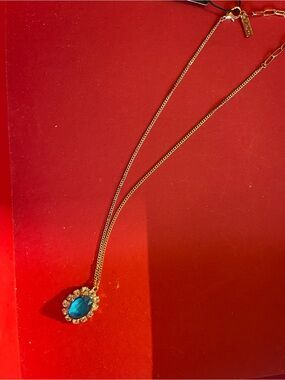 Tova Gold Necklace with Teal Blue Crystal Halo Pendant